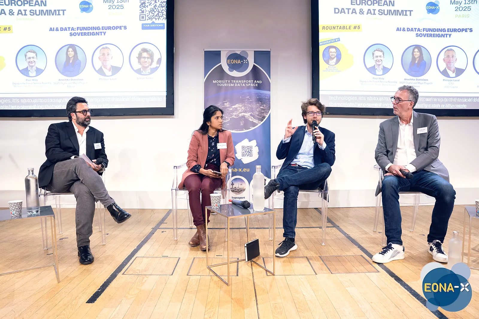 Four speakers on stage during the panel “AI & Data: Funding Europe’s Sovereignty”